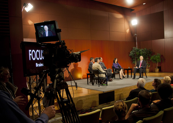 The panel discussion taping in the Nasher Museum Auditorium. Host Alan Alda is at right. (Megan Morr, Duke Photography)