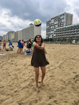 Nina Cervantes hitting a volleyball 